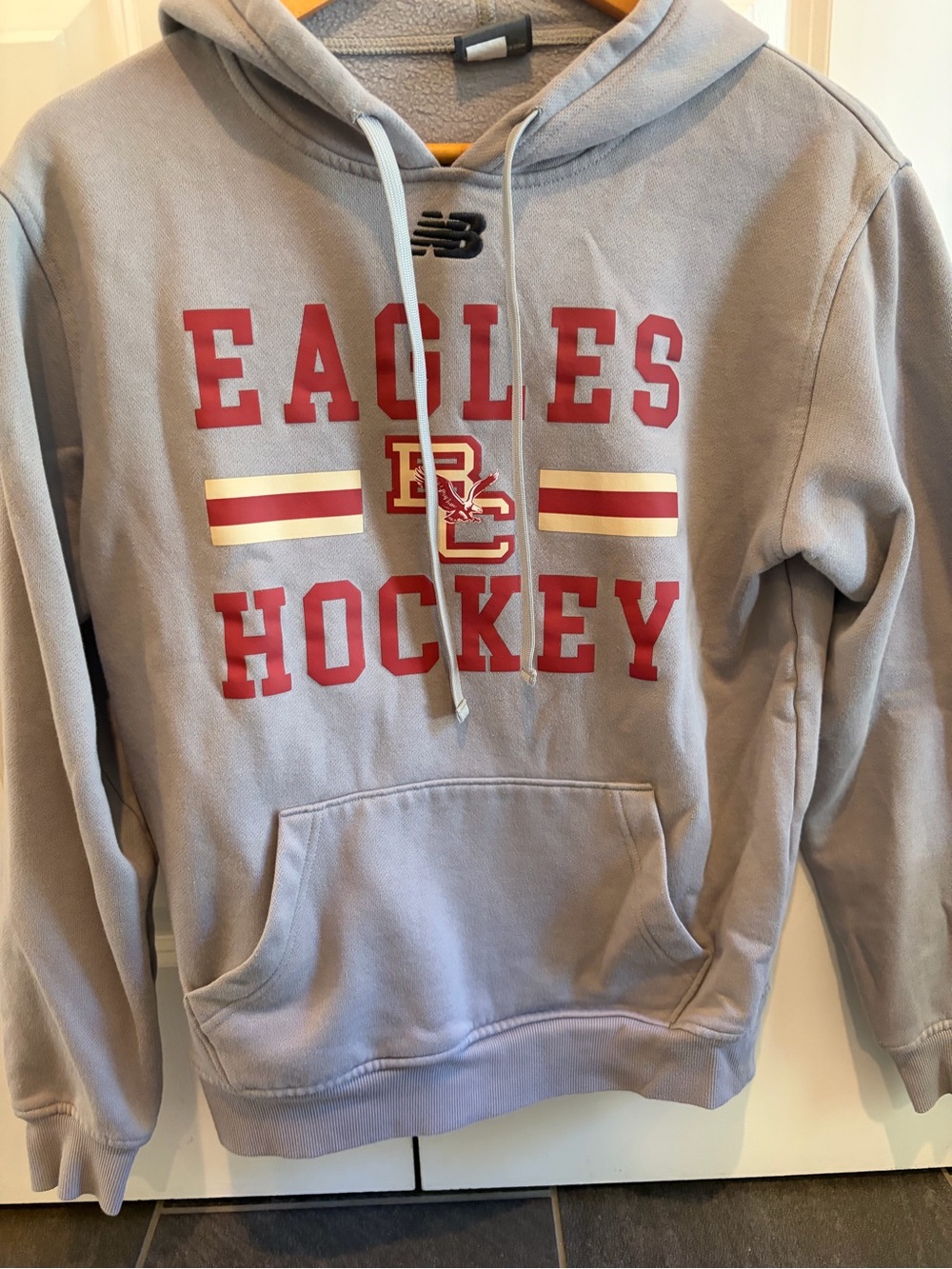 New Balance women’s Gray Eagles Hockey Pullover Hoodie